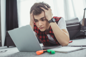 teen stressed laptop